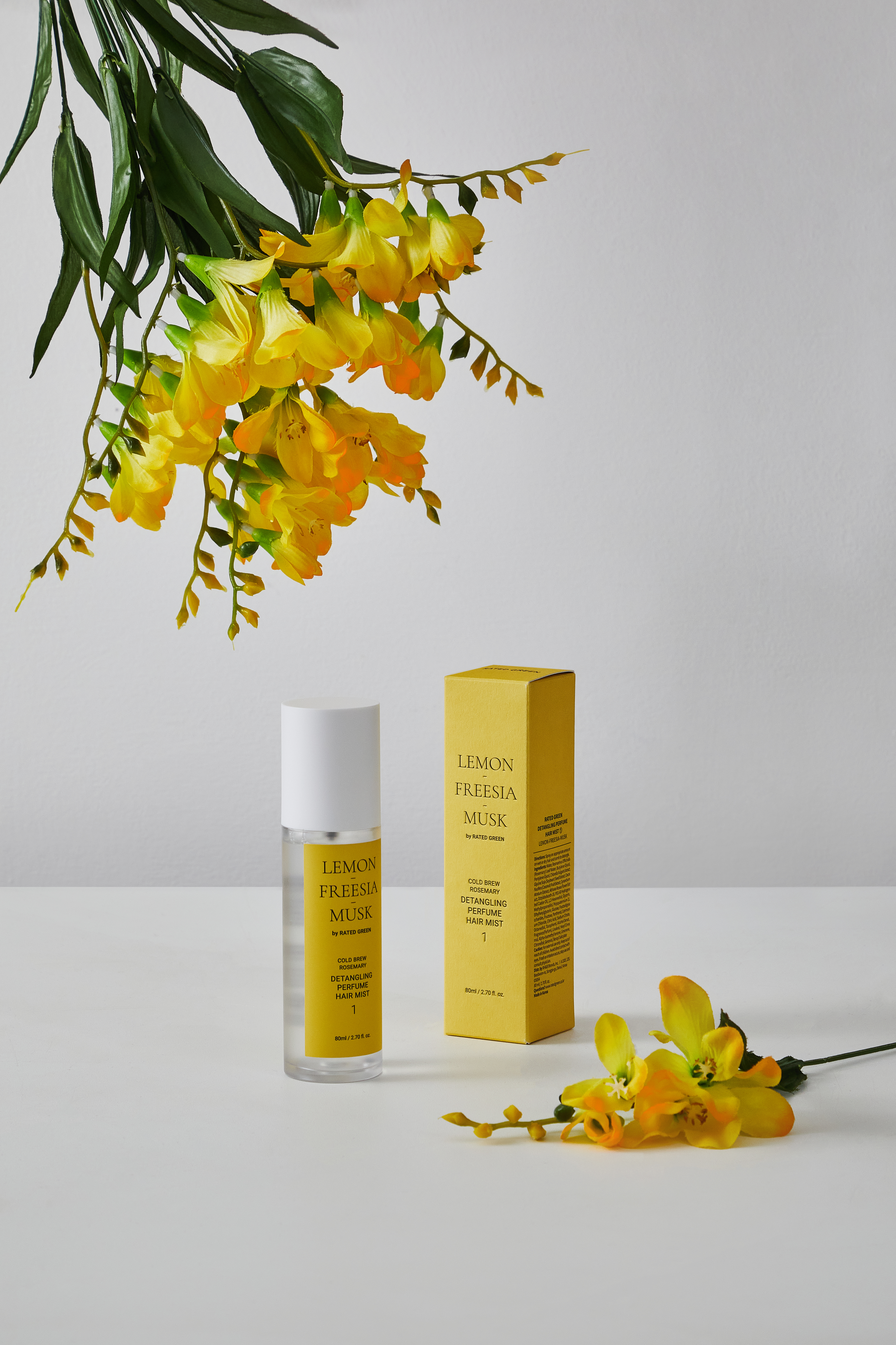 Парфумований міст для волосся з ароматом лимона, фрезії та мускусу Rated Green Detangling Perfume Hair Mist